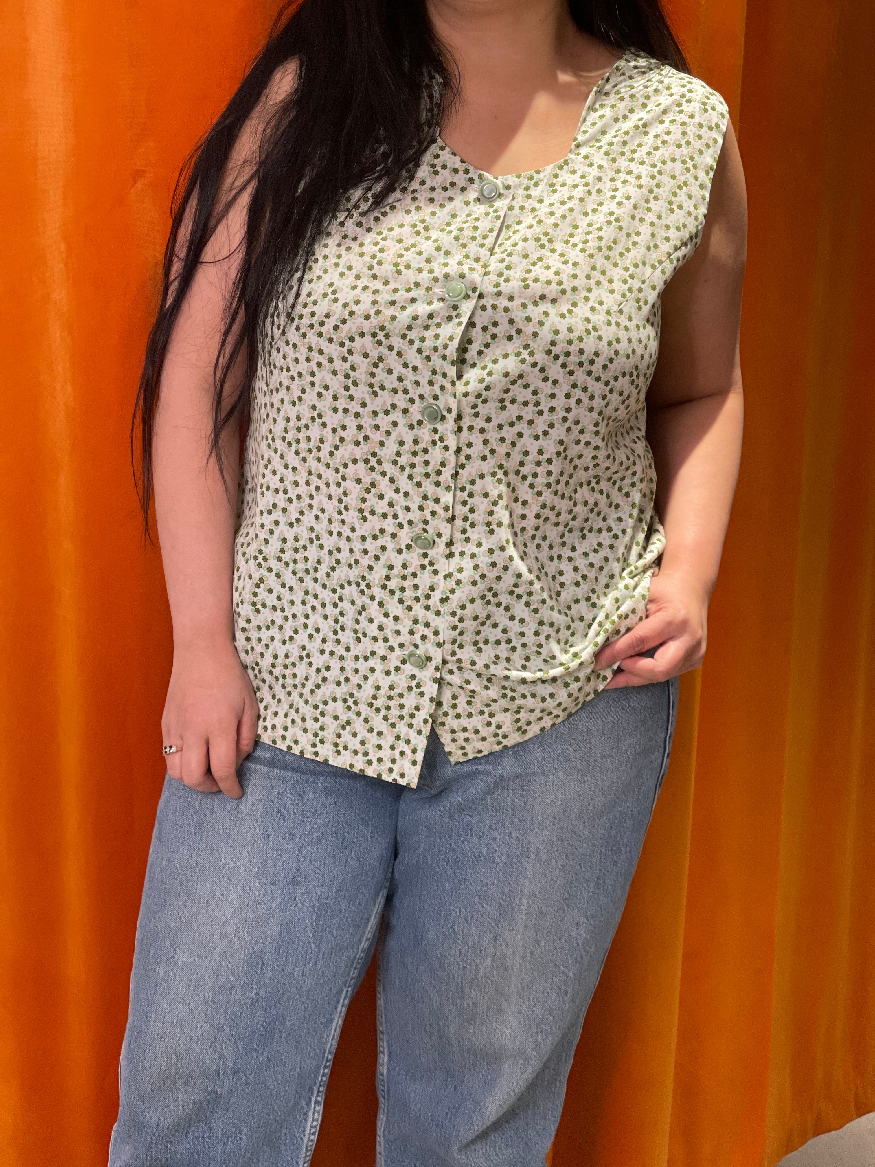 Model 1 is 5β5β, typically wears size 12 or large in current day clothing.