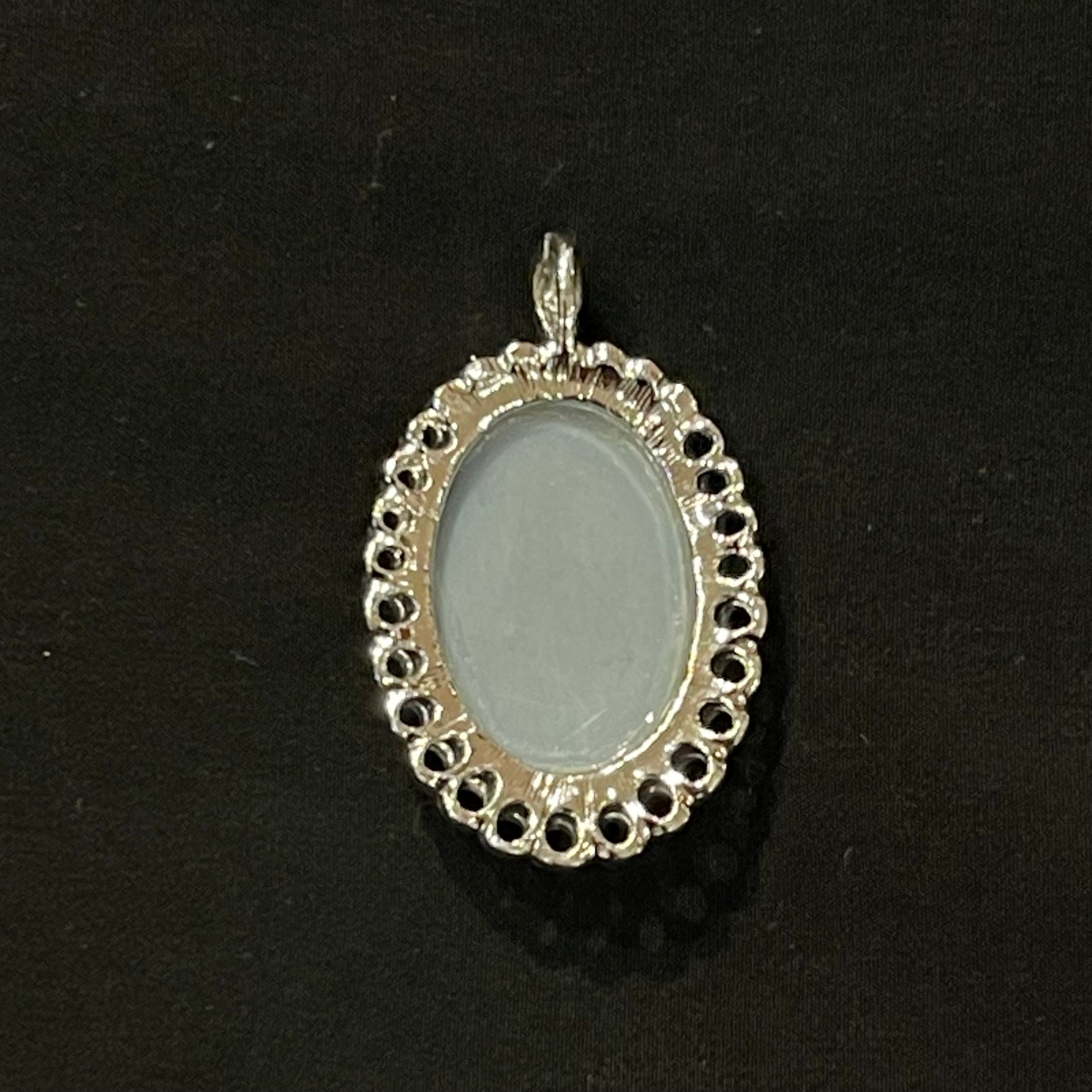 Blue and White Oval Cameo Pendant with Silver Trim