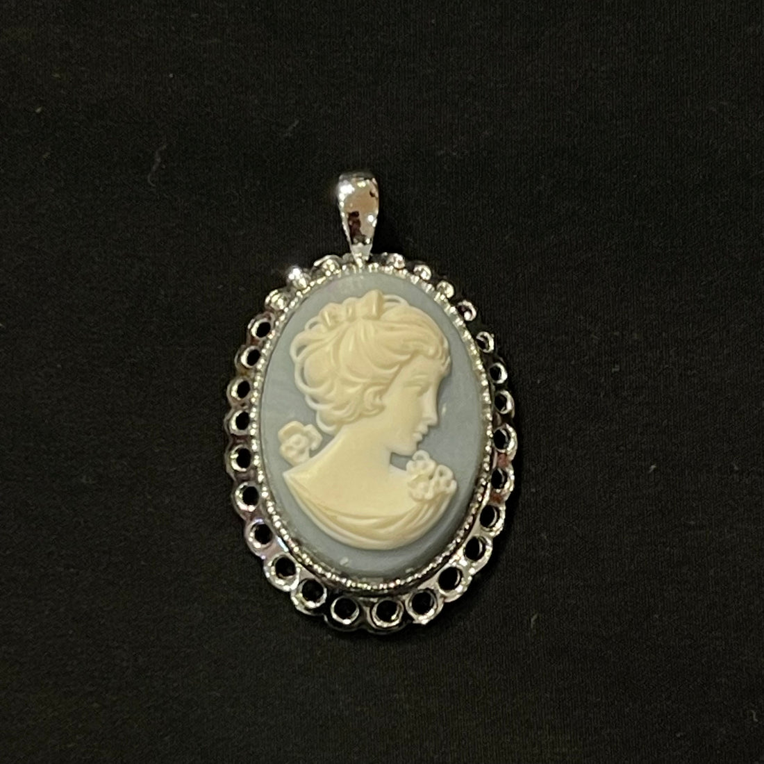 Blue and White Oval Cameo Pendant with Silver Trim